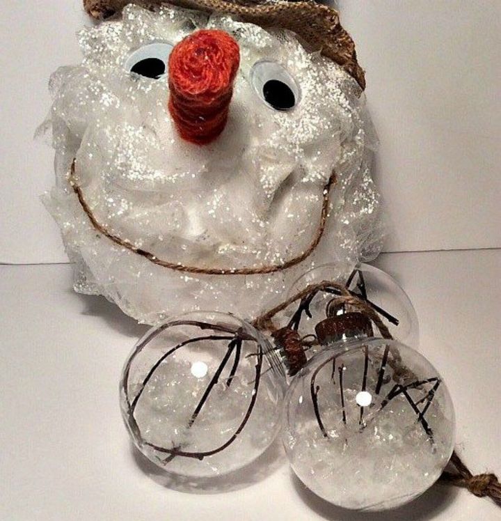 s 13 surprising ways to make a snowman for your porch, Gather some tulle around a styrofoam ball