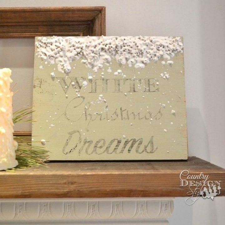 s let it snow with these 12 winter decorating ideas, Melt white crayons on a canvas