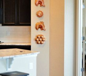 don t throw out that old cake pan before you see these 11 ideas, Hang it as metal wall decor in your kitchen