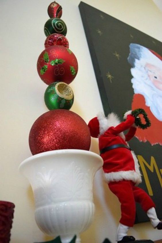 s forget your tree this will make you rethink where you hang ornaments, christmas decorations, seasonal holiday decor, Stack them into an ornamental topiary