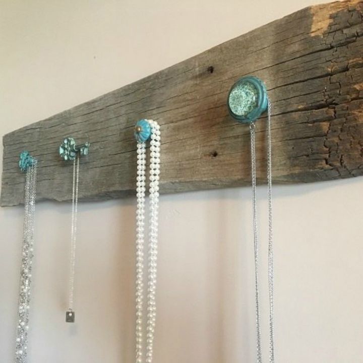 s 13 clever ways to hang up your jackets, Screw colorful knobs onto barn wood