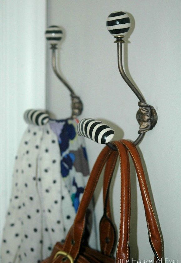 s 13 clever ways to hang up your jackets, Paint hooks with stripes for an anthro look