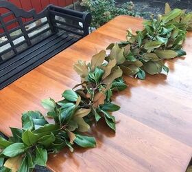 a diy magnolia garland helps you set a welcoming christmas table , flowers, gardening, painted furniture