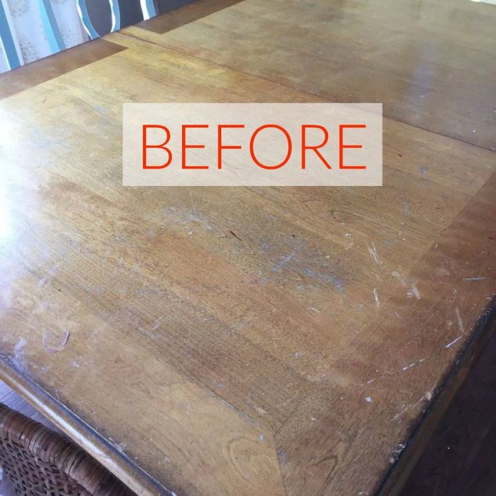 s 9 dining room table makeovers we can t stop looking at, painted furniture, Before A dinged and dented overused table