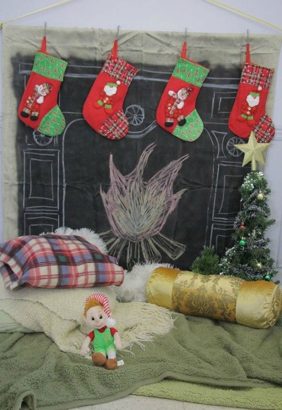 s 13 handmade christmas ideas you didn t know you were waiting for, christmas decorations, This faux fireplace with hanging stockings
