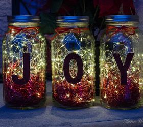 make gorgeous christmas luminaries using mason jars and twinkle lights, mason jars