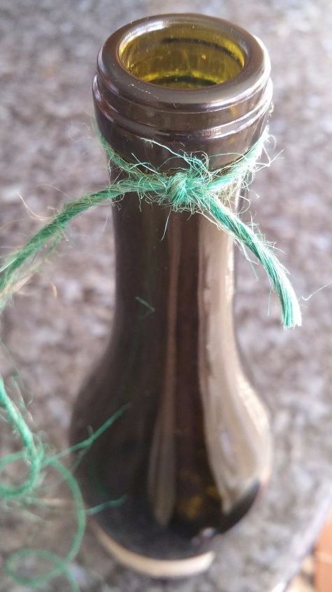 decorative twine wrapped wine bottle