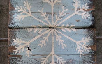 Copos de nieve de madera de palets pintados