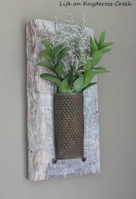 13 low budget ways to decorate your living room walls, Add some rustic plant wall decor
