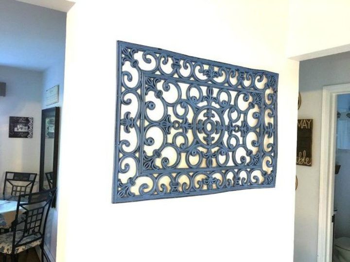 13 low budget ways to decorate your living room walls, Hang a rubber door mat