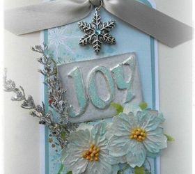 s fold tin foil for these breathtaking christmas decor ideas, christmas decorations, home decor, This embossed metal joy tag