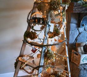 s forget your traditional christmas tree these are even better, Wrap ornaments and garland around a ladder