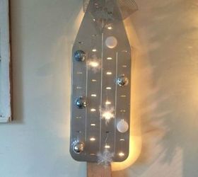 s forget your traditional christmas tree these are even better, Put holes in an old ironing board