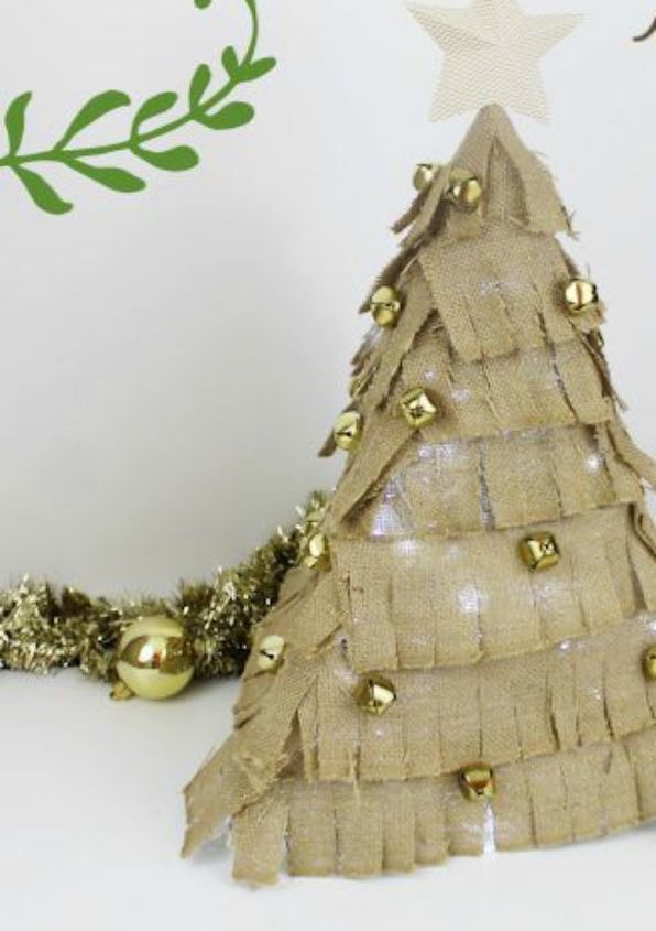 s 17 mini christmas trees we can t stop looking at this season, 8 The homey hanger tree