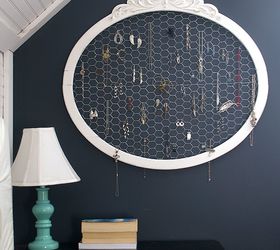 an old frame and chicken wire upcycled into a jewelry hanger