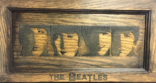 the beatles carved wood finish