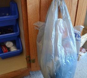 s 14 brilliant command hook hacks for your home, home decor, Store all of your plastic bags under the sink