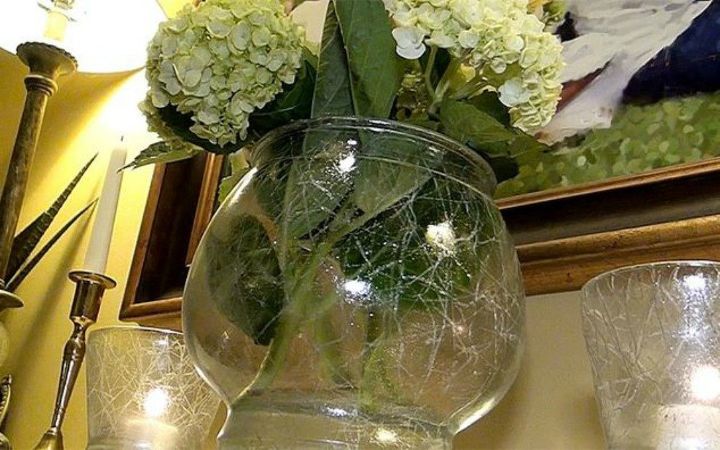 s transform cheap glass vases with these 17 stunning ideas, Draw with a crayon for a crackled glass look