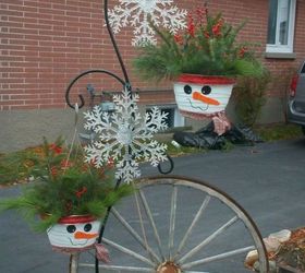 s 13 winter planter ideas for when you re missing your garden, gardening, A snowman themed hanging planter with holly