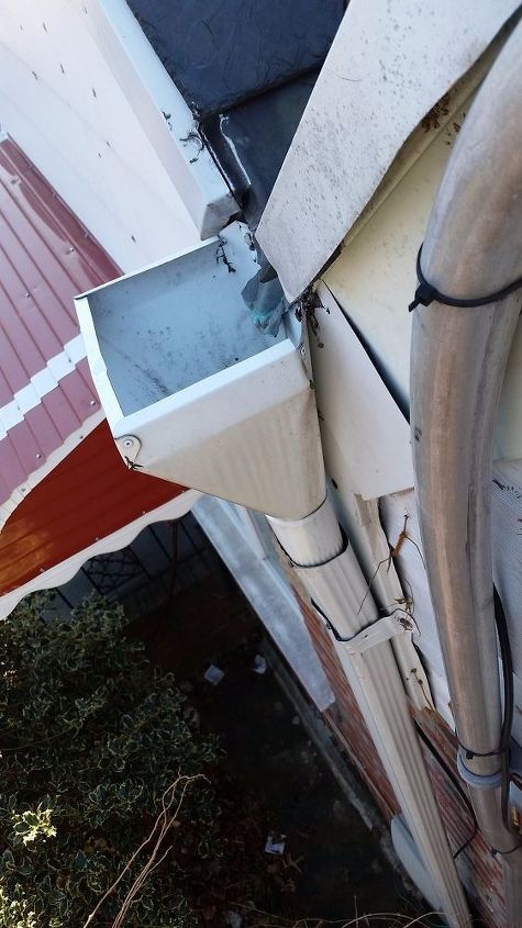 diy tip top gutter cleaning 101, Flushing down open gutters is next in line