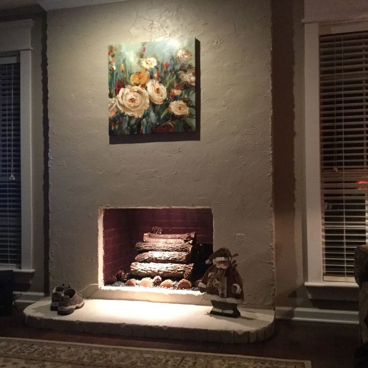 q como puedo decorar mi gran chimenea