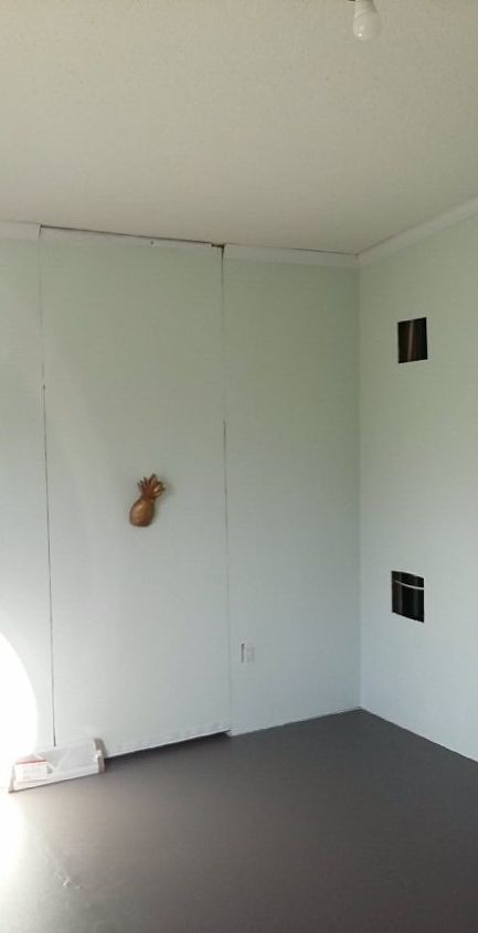 how can i make this hidden door more hidden and less hideous