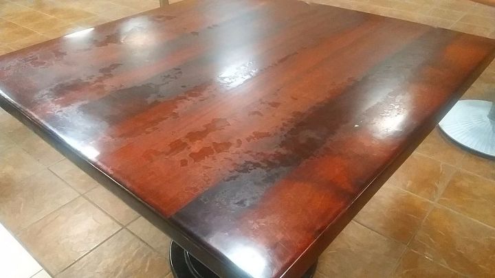 how can i remove these water marks from wood tables