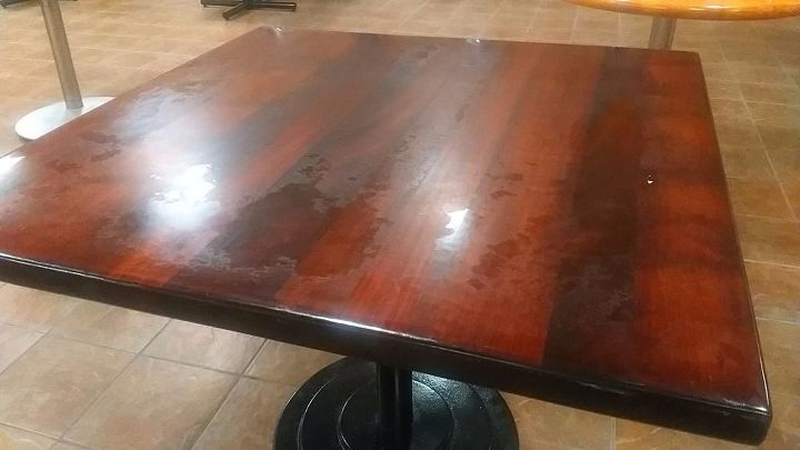 how can i remove these water marks from wood tables