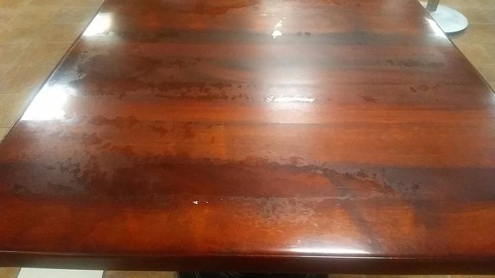 q como puedo eliminar estas marcas de agua de las mesas de madera