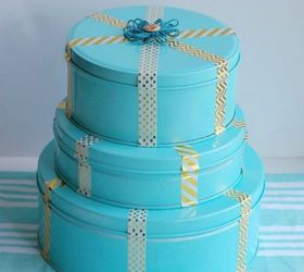 s don t throw away those popcorn tins before you see these 13 ideas, Paint them into bright gift boxes