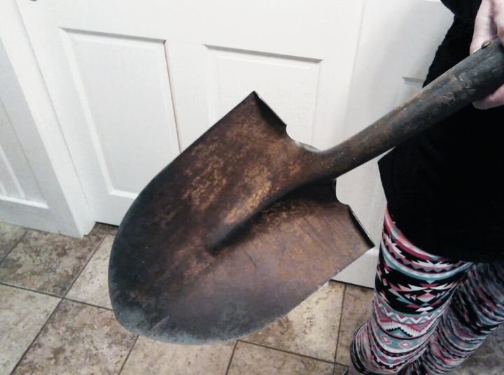 give an old rusty shovel and new purpose