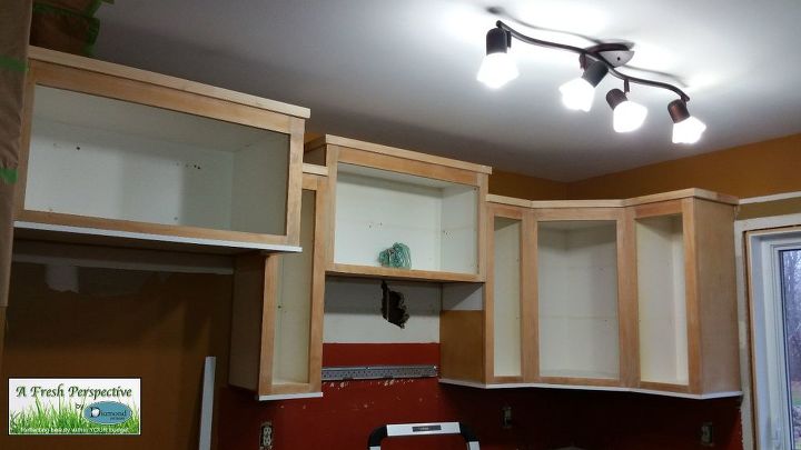 inexpensive kitchen cabinet mouldings, kitchen cabinets, kitchen design, wall decor, woodworking projects, The moulding installed