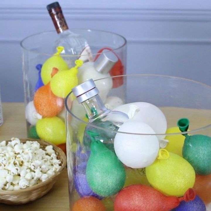 s be the best hostess on the block with these 16 home hacks, home decor, Use water balloons to keep your drinks cold