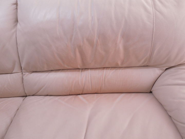 how can i get rid of a red pillow stain on a white leather couch