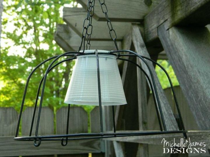 you need to try these dollar store bucket ideas, Hang them outside for extra lighting