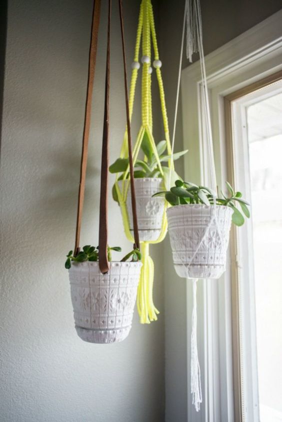 cut up old belts for these 13 amazing decor ideas, Make them into cool plant hangers