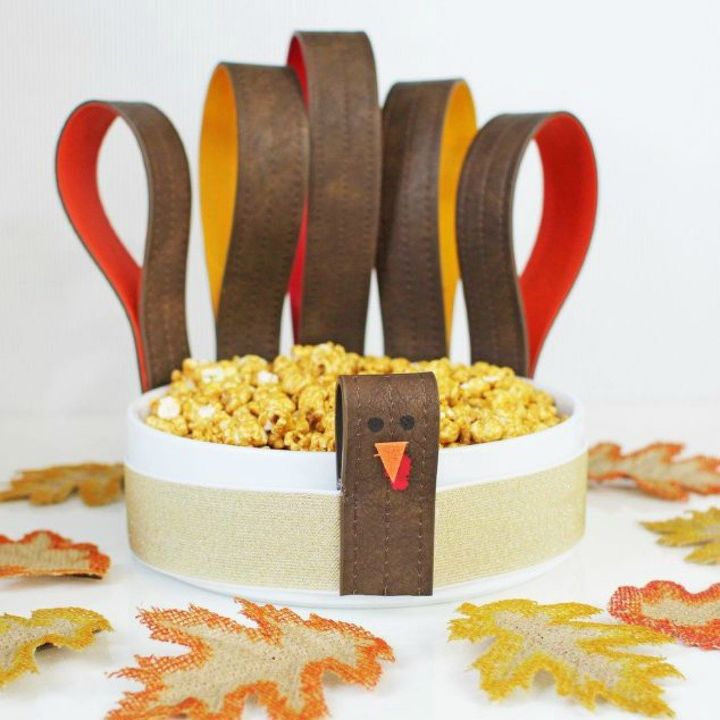 cut up old belts for these 13 amazing decor ideas, Style them into a thanksgiving turkey bowl