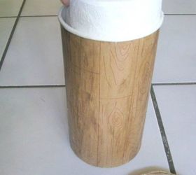 dont throw away that oatmeal container before you see these 14 idea, Use it to camouflage your toilet paper