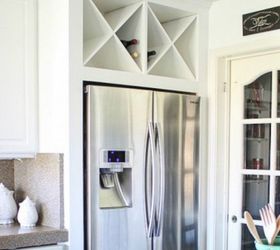 15 clever ways to add more kitchen storage space with open shelves, Place open shelving above your fridge