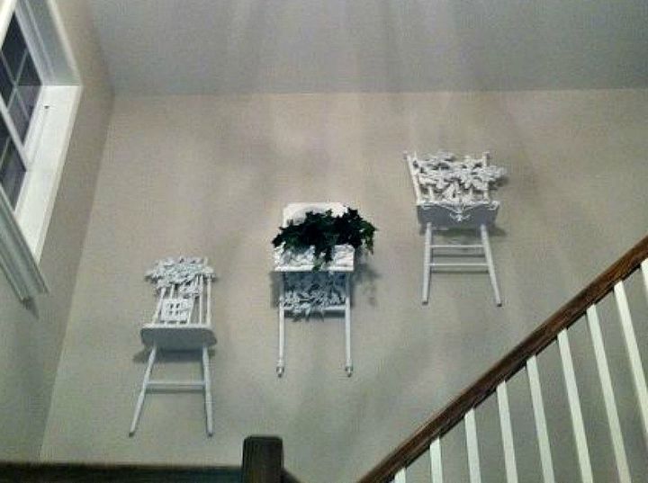 15 brilliant ways to reuse that broken chair, Repaint them into unique stairway wall decor