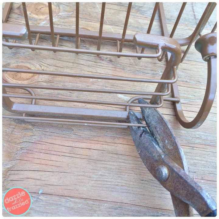 use a shower caddy as wall planter, Snip the wires of the soap holder