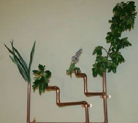s these 11 copper pipe ideas will make you rethink your decor, home decor, plumbing, This floating copper pipe planter