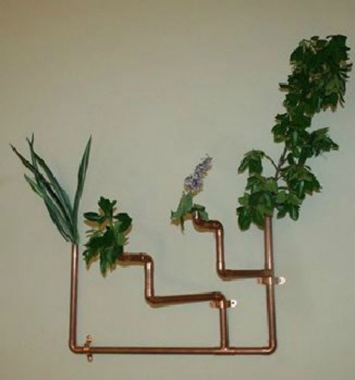 s these 11 copper pipe ideas will make you rethink your decor, home decor, plumbing, This floating copper pipe planter