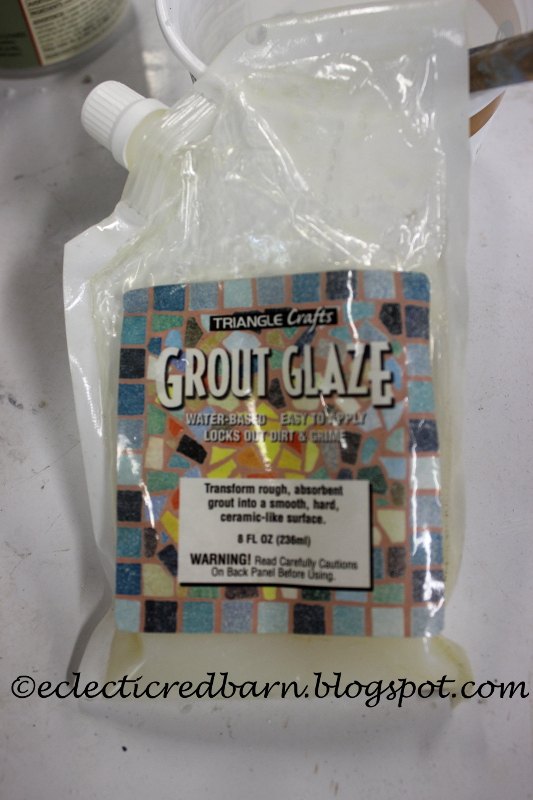 using a vase and a globe for decorative garden art, crafts