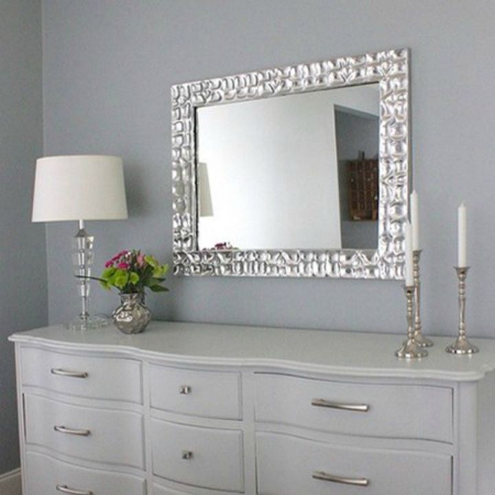 s 13 incredible living room updates using leftover wood, Frame your entryway mirror