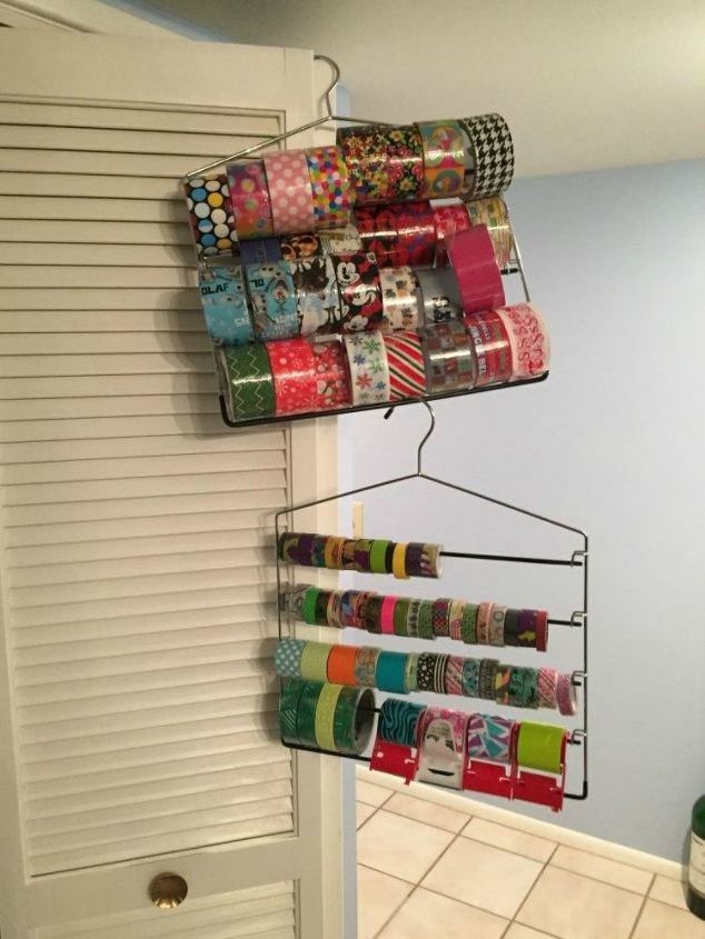 s why you should use hanging storage from now on 13 ways, storage ideas, Place your rolls of tape on a pants hanger
