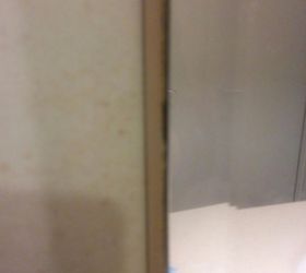 what s the best way to glue glass tiles on a bathroom mirror