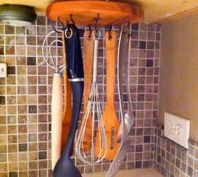 s organize your kitchen with these 16 simple and cheap storage ideas, kitchen design, organizing, storage ideas, Hang your utensils from your cabinets