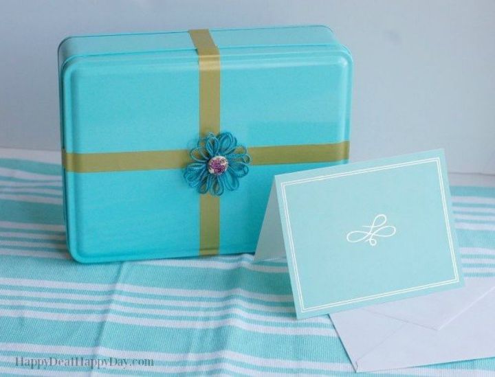 cut a piece of washi tape for these 25 creative ideas, Wrap pieces over old tins to make gift boxes