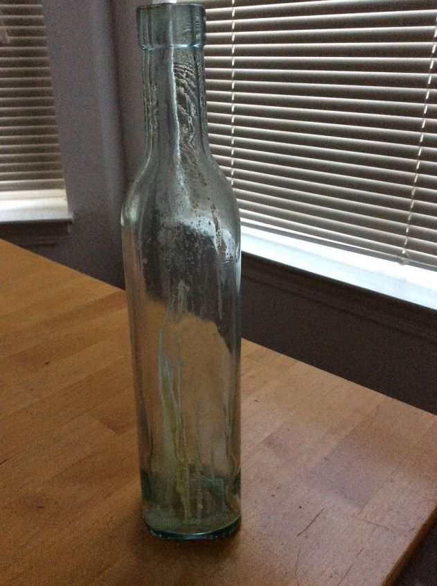 i want to remove old olive oil from this bottle any ideas